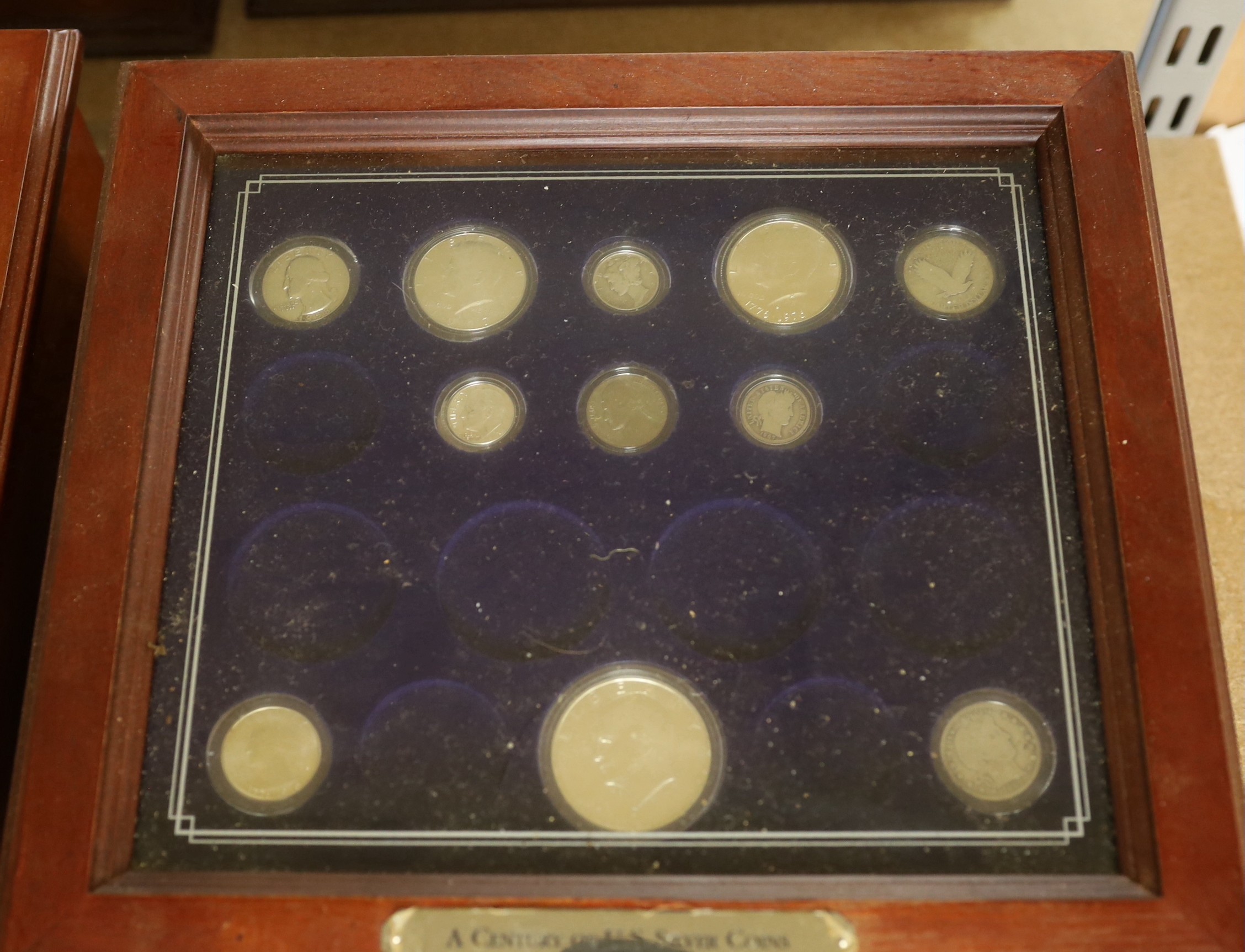 A group of incomplete boxed collector's coin sets